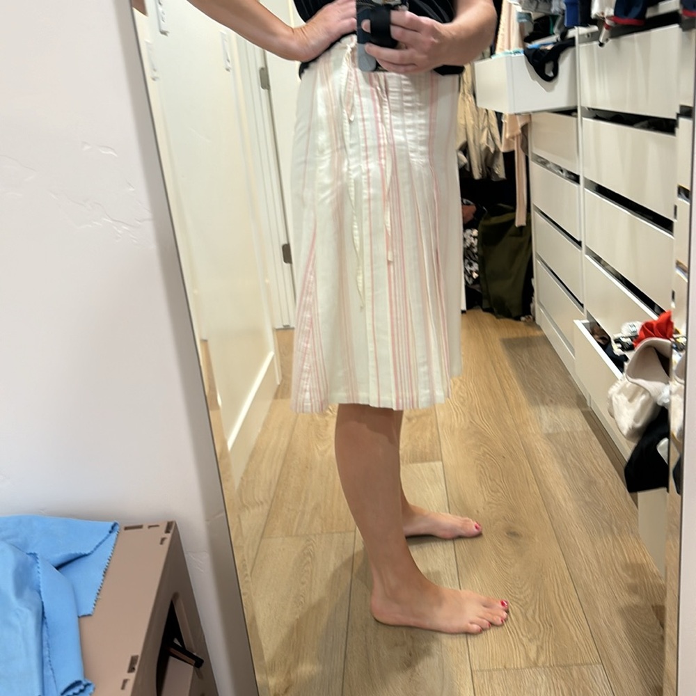 Cream and pale pink pleated and a line skirt from H&M.